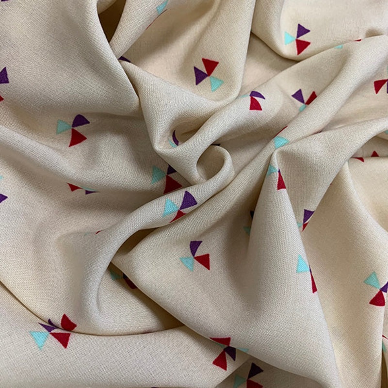 Beige Pinwheel Print Rayon Challis Fabric